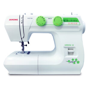 A compact Janome Sewing Machine in a stylish green finish sitting on a white table.
